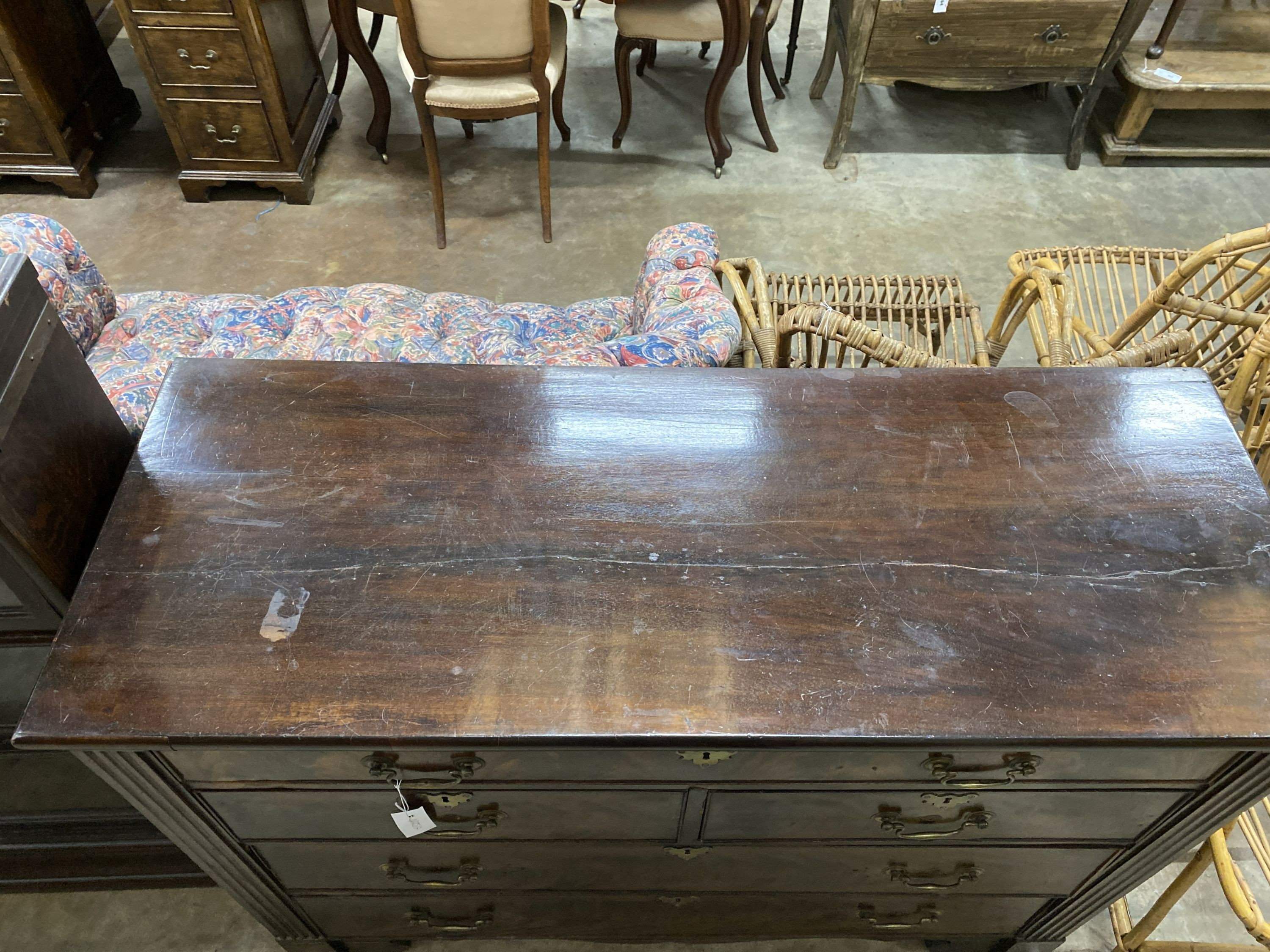 A George III mahogany chest of drawers, width 127cm, depth 49cm, height 94cm